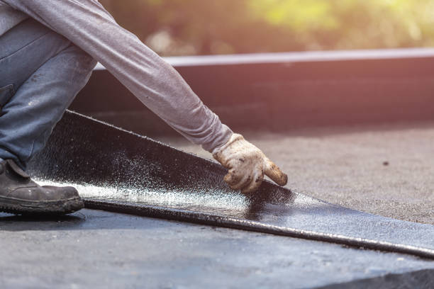 Professional Basement Waterproofing technician working in Winnebago, MN